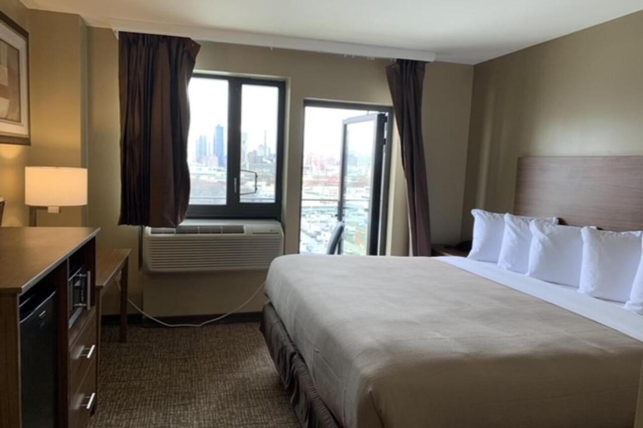 Astoria Delancy Inn & Suites Нью-Йорк Экстерьер фото